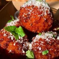 Crispy Mac & Cheese Balls · Crispy Mac & Cheese Balls topped with Cilantro and Cotija Cheese served with our House Made ...