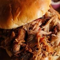 Pulled Pork Sandwich · Pulled Pork Sandwich with your choice of a Side.