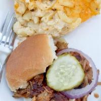 Family Meal Feeds 3-6 · Our Feast Family Meal feeds 3-6 and includes 1.5# of Our House Smoked Pulled Pork, Chopped C...