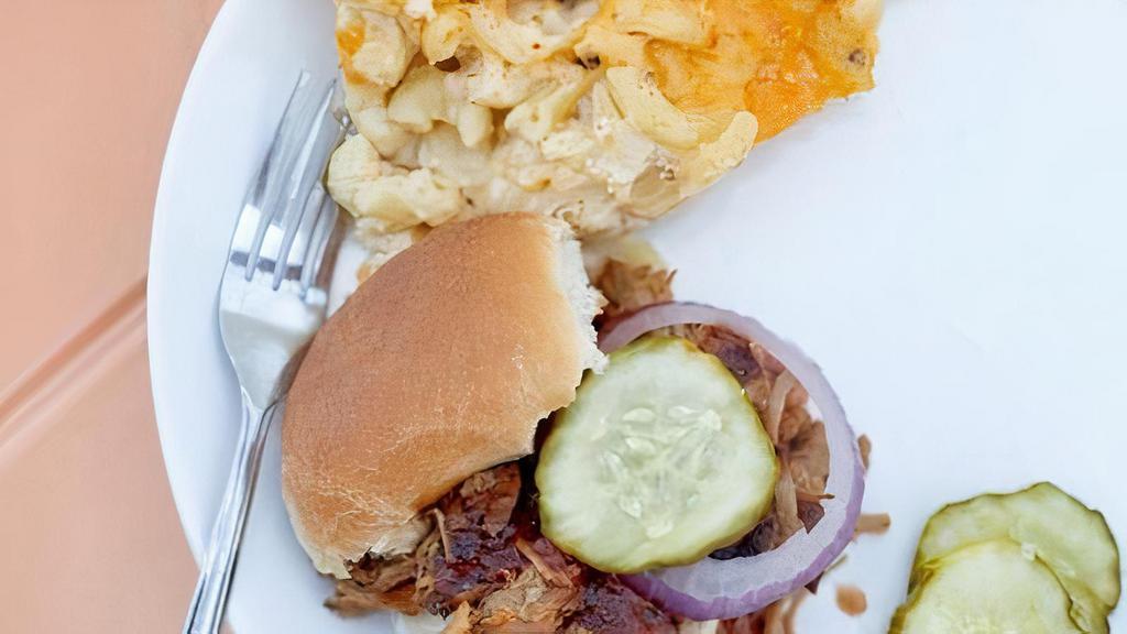 Family Meal Feeds 3-6 · Our Feast Family Meal feeds 3-6 and includes 1.5# of Our House Smoked Pulled Pork, Chopped Chicken, or Crispy Tofu (Brisket is just $7.45 more), A Pint Each of 3 Different Sides, 6 Buns, and Barbecue Sauce on the side for the family.