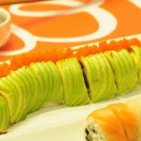 Green Dragon Roll · Inside: bbq eel and cucumber. Top: sliced avocado and fish egg with eel sauce.
