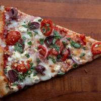The Greek Pie · Our tomato sauce, mozz, feta cheese, roasted tomatoes, red onions, Kalamata olives, fresh or...