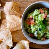 Tortilla Chips & Guacamole · lightly sea salted tortilla chips with fresh guacamole made daily inhouse