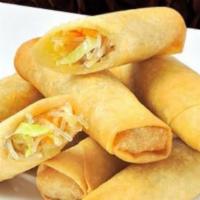 Veggie Spring Rolls · Deep fried spring roll stuffed with glass noodle and vegetables served with plum sauce.