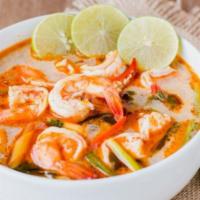 Tom Yum Shrimp · Spicy. A signature soup with shrimp, mushroom, lemon grass, and lime juice.