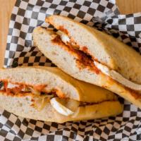 Brie · Brie cheese, sundried tomato pesto with caramelized onions on a warm baguette.