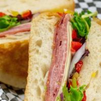 Capri · Prosciutto, genoa salami, capicola and provolone with mixed greens, roasted red peppers, hot...