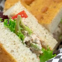 Tuna Salad · White Albacore Tuna with bread crumbs, yogurt sauce, roasted red peppers and mixed greens on...