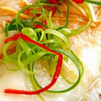 Steam Flounder Fish Fillet With Ginger And Green Onion · Fresh steam flounder fish fillet with ginger and green onion