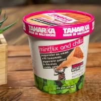 Taharka Mintflix And Chillz Pint · Peppermint ice cream with homemade peppermint patties and a fudgy chocolate cookie crumb swirl