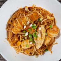Pad Thai · Rice noodles, egg, tofu, bean sprouts, scallions in our traditional homemade sauce with chop...