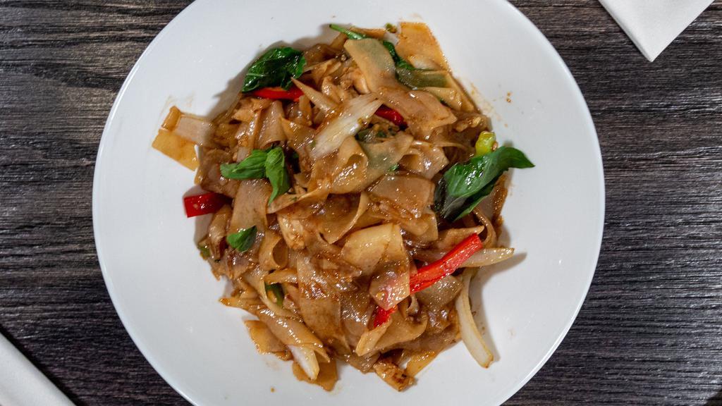 Basil Noodle (Drunken Noodle) · Flat rice noodles with Thai chili paste, basil, onion and bell pepper.