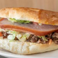 Torta Mexicana · Your choice of beef or chicken slices of ham, avocado lettuce and tomatoes.