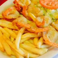 Shrimp Plate · 10pc Breaded Shrimp Cooked to golden Brown Served W/ Fries And Salad 1 Texas toast .