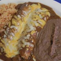 Cheese Enchiladas · 2Cheese enchiladas served with rice and beans.