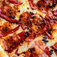 Sweet Sopressata Pizza · Italian Dry Aged Salami, Roasted Calabrian Chili Peppers & a Light Drizzle of Honey.