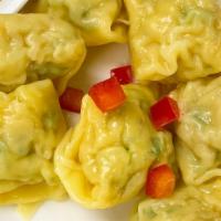 Steam Ravioli · Steamed ravioli stuffed with shrimp, fresh crabmeat and scallion, served with house dipping ...