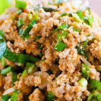 Laab  · (Gluten Free) Saute’ ground chicken mixed with red onion, spring onion, mint leaves, ground ...