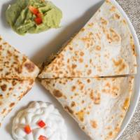 Chicken Quesadilla · Served with a soft flour tortilla sauteed onions tomatoes shredded cheese and salsa.