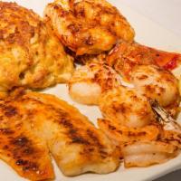 Jewels Of The Sea · Petite Lobster Tail, 8 oz Crab Cake, Jumbo Shrimp & Jumbo Scallops broiled & served with dra...