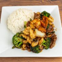 Triple Delight · Shrimp, chicken and beef stir-fried with fresh, mixed vegetables.
