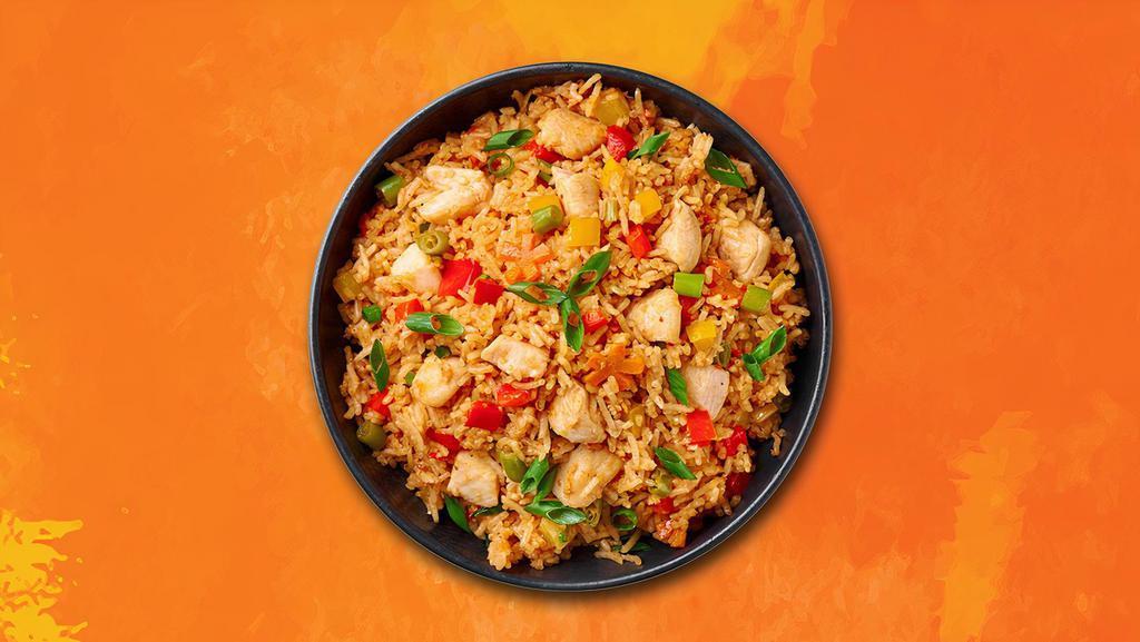 Schezwan Hot Chicken Fried Rice · Szechuan fried rice is hot & spicy with boneless pieces of chicken and bursting flavors of chili, garlic, peas, and carrots.