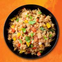 Asian Street Veggie Fried Rice · White rice has been stir-fried in a wok and cooked with green onion, tomato, and white onions.