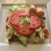 Flautas · Flavorful rolled and deep-fried corn tortilla filled with chicken, cover with fresh lettuce,...