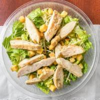 Grilled Chicken Caesar Salad · Fresh romaine, grilled chicken, Parmigiana Reggiano and house croutons tossed in our homemad...