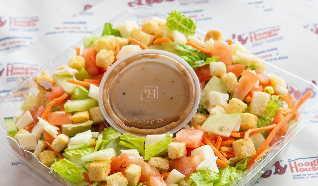 Caesar Salad · Fresh romaine, Parmigiana Reggiano and house croutons tossed in our homemade caesar dressing.
