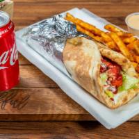 Mediterranean Chicken Koobideh Wrap Combo · Seasoned 2 skewers of ground chicken in a bread with chopped salad and topped with homemade ...