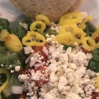 Greek Salad · Vegetarian. Romaine, Kalamata, olives, onions, mild pepper, tomato, feta cheese, and balsami...