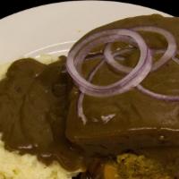 Meat Loaf Dinner · The food you grew up with! Large piece of homemade meat loaf topped with gravy.