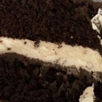 Hoho Cake · Moist chocolate cake with whipped frosting and chocolate glaze.