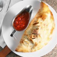 Create Your Own Calzone · Comes with mozzarella cheese and one topping.