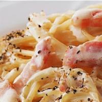 Carbonara · Creamy sauce with pancetta (Italian bacon) and parmigiano cheese tossed with spaghetti.