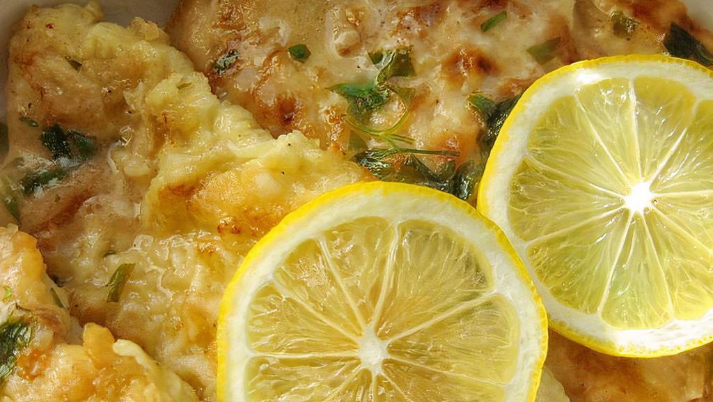 Veal Francese · Dipped in egg better and sautéed sherry wine with lemon parmigiana sauce.