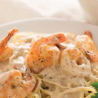Shrimp Scampi · Shrimp in a creamy white wine and garlic sauce tossed with linguine.