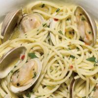 Linguine Alle Vongole · Italian baby clams, fresh garlic, and parsley in a red or white wine sauce over linguine.