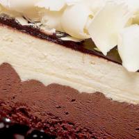 3 Chocolate Mousse · White and dark chocolate mousse on sponge base, coated with chocolate and topped with white ...