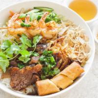 Vermicelli Special · Enjoy this all-in-one vermicelli noodle bowl, served on a bed of herb salad, and topped with...