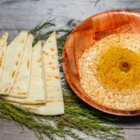 Hummus · Mediterranean spread made from cookies, mashed chickpeas, blended with tahini, olive oil, le...