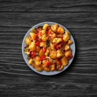 Cauliflower Potato Masala · Fresh cauliflower and potatoes cooked with herbs and spices. Served with a side of aromatic ...