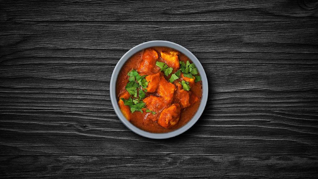 Char Grilled Chicken Tikka Masala · Chargrilled chicken morsels slow-cooked in a rich onion and tomato gravy with generous amounts of butter. Served with a side of aromatic basmati rice.