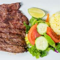 Carne Asada / Grilled Steak · Grilled steak served with rice, refried beans, salad, pico de gallo, cheese, 2 tortillas.