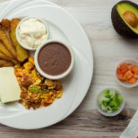 Típico Salvadoreño / Typical Salvadorian · Scrambled eggs with chorizo (Salvadoran sausage), fried plantains, refried beans, cream, che...