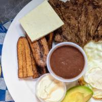 Tipico Hondureño · Traditional Honduran style breakfast. 2 over medium eggs, grilled steak, fried plantains, re...