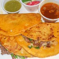 Birria Tacos · Order of 3. Authentic and delicious Mexican style. Beef chunks slowly braised in a guajillo ...