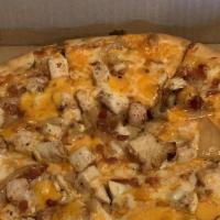 Buffalo Chicken Pizza Medium · Breaded or grilled chicken topped off with buffalo sauce or BBQ sauce (white or red).