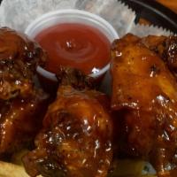Bourbon Wings · Cooked to customers satisfaction